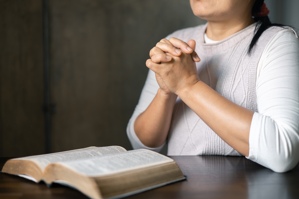 Female hands worship to god. Woman hands praying to god. Christian life crisis prayer to god. Woman pray for god blessing to wishing have better life. begging for forgiveness and believe in goodness.