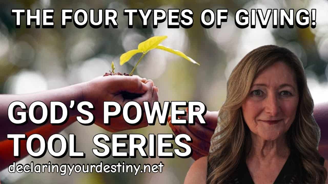 Woman smiling, plant sprout in hands.